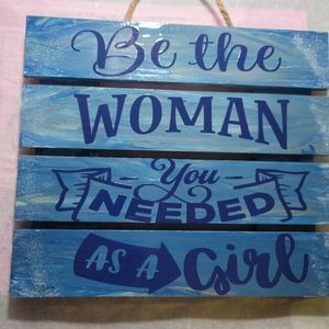 Be the woman you needed as a girl sign
